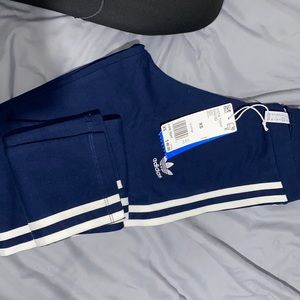 Adidas 3 stripes full length leggings.